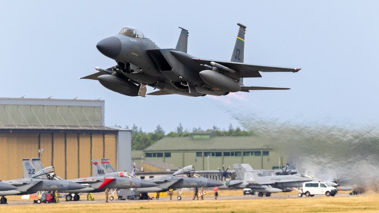 openai An F-15 Eagle fighter jet flying low